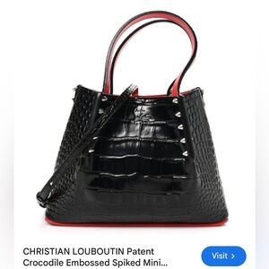 Christian Louboutin Black and Red Mini Bag with Signature Design
